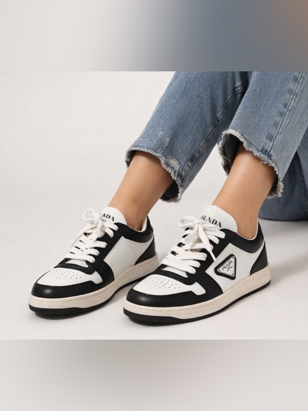 Prada Downtown Black and White Leather Low-Top Sneakers